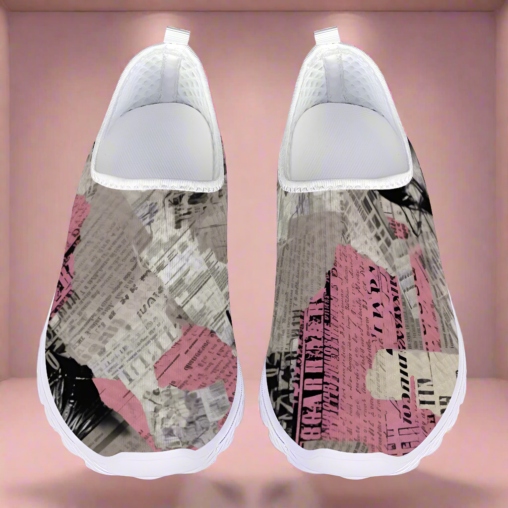 A lightweight slip-on sneaker featuring a pattern of torn newspaper articles in various shades of pink, black, and gray. Made with breathable mesh fabric for added comfort and style, the Pretty Confidential Non-Slip Lightweight Sneakers are perfect for any casual outing.