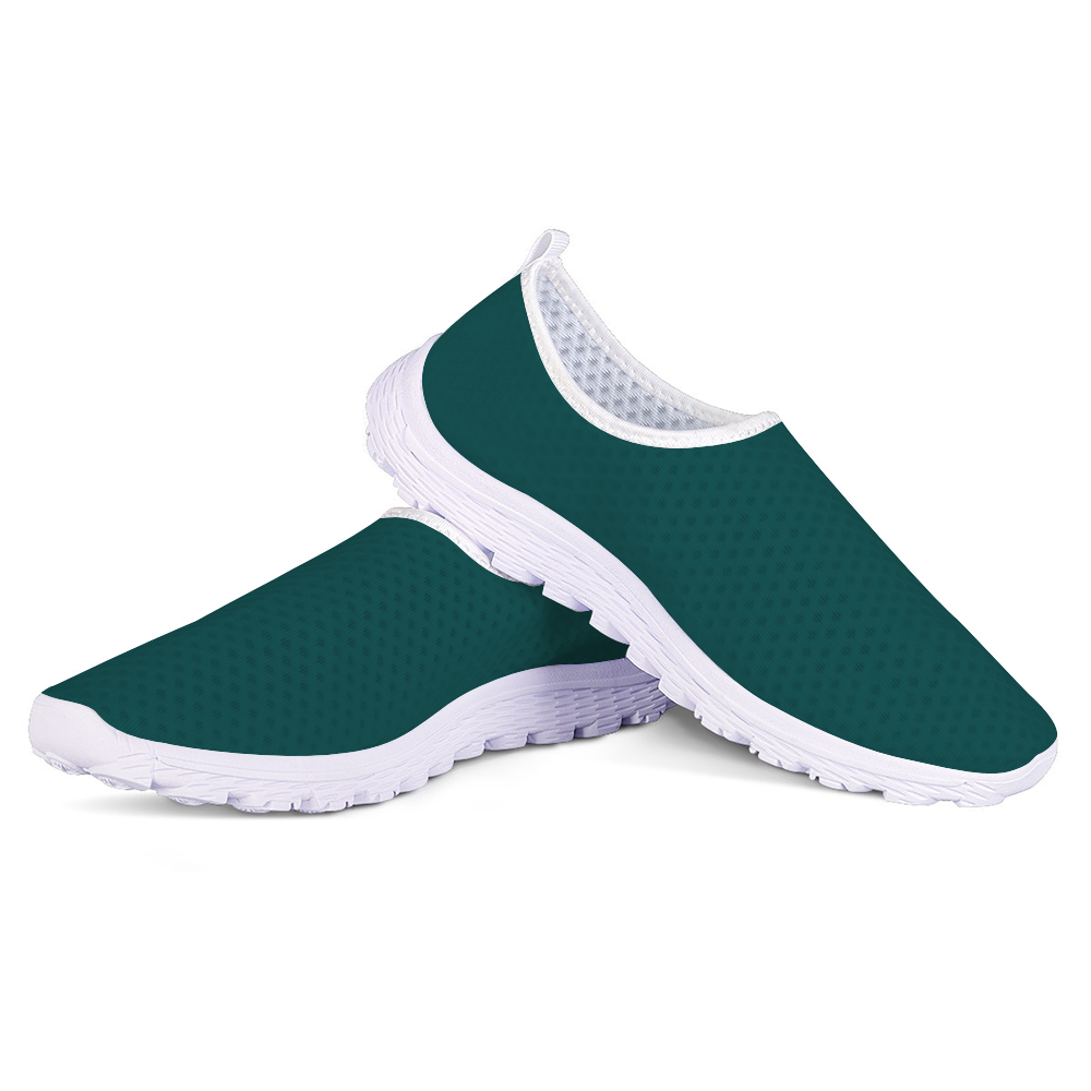 Meet the Philly Jawn Cushion Kicks: teal slip-on sneakers designed for style and functionality, with a breathable mesh upper, white trim, cushioned textured sole, and slip-resistant technology.