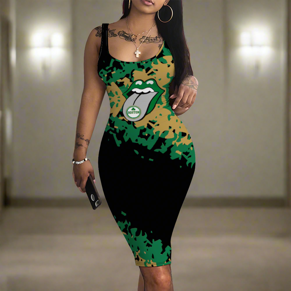 A woman wearing a Boston Women's Tank Dress - Black with a green and black graphic pattern featuring a cartoon mouth with a sticking-out tongue. This custom all over print women's tank dress boasts high-quality printing. She holds a phone in her left hand and has long dark hair.