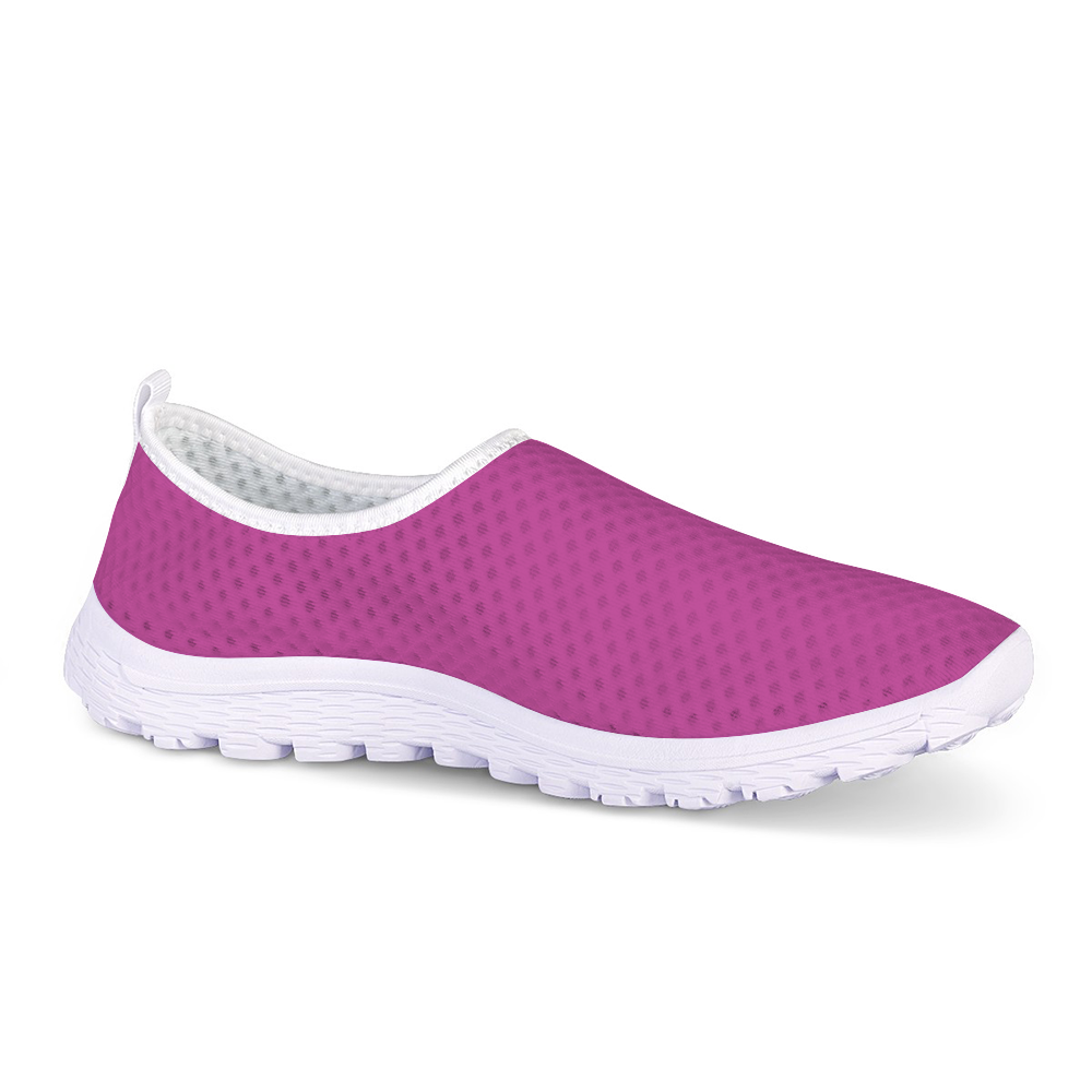 The Melanin Love Cushion Kicks are stylish slip-on sneakers in pink, featuring a slip-resistant white sole and a perforated mesh fabric design.