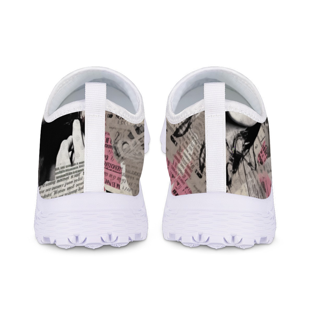 A lightweight slip-on sneaker featuring a pattern of torn newspaper articles in various shades of pink, black, and gray. Made with breathable mesh fabric for added comfort and style, the Pretty Confidential Non-Slip Lightweight Sneakers are perfect for any casual outing.