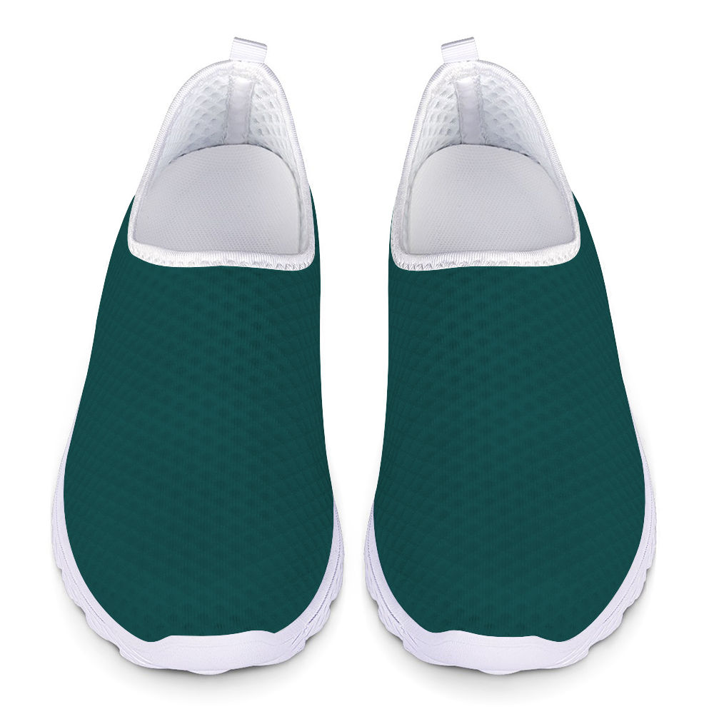 Meet the Philly Jawn Cushion Kicks: teal slip-on sneakers designed for style and functionality, with a breathable mesh upper, white trim, cushioned textured sole, and slip-resistant technology.