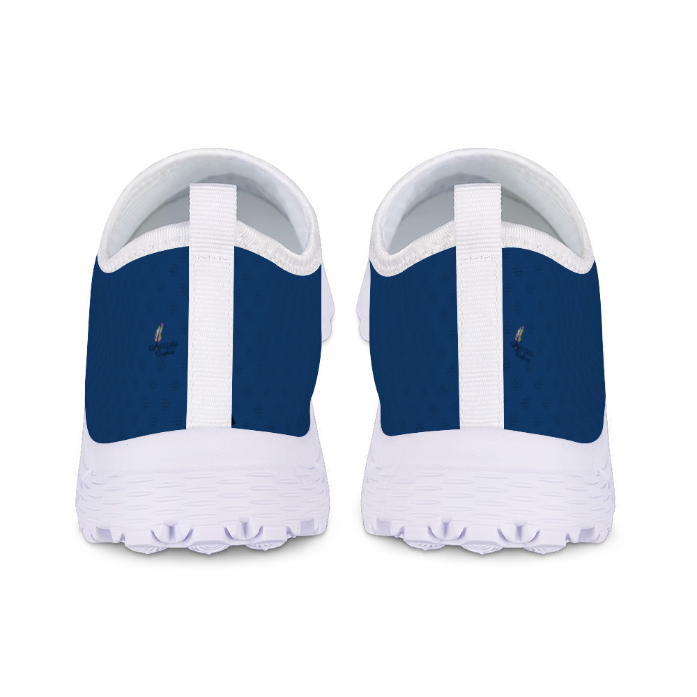 A side view of the Denim Blue Kushion Kicks showcases its white sole and mesh fabric upper against a plain white background.