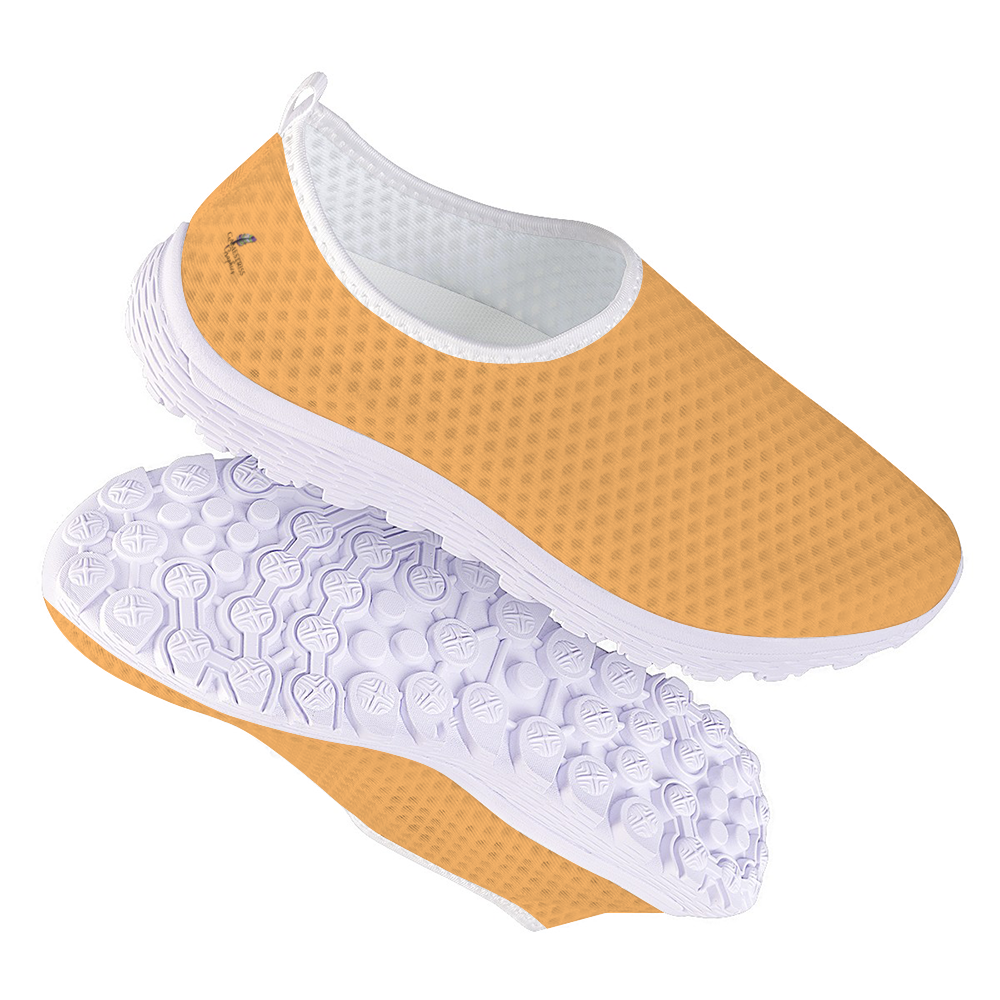 The Sophisticated Glamour Cushion Kicks feature a slip-on design with a yellow textured mesh fabric upper, complemented by a sleek white sole.