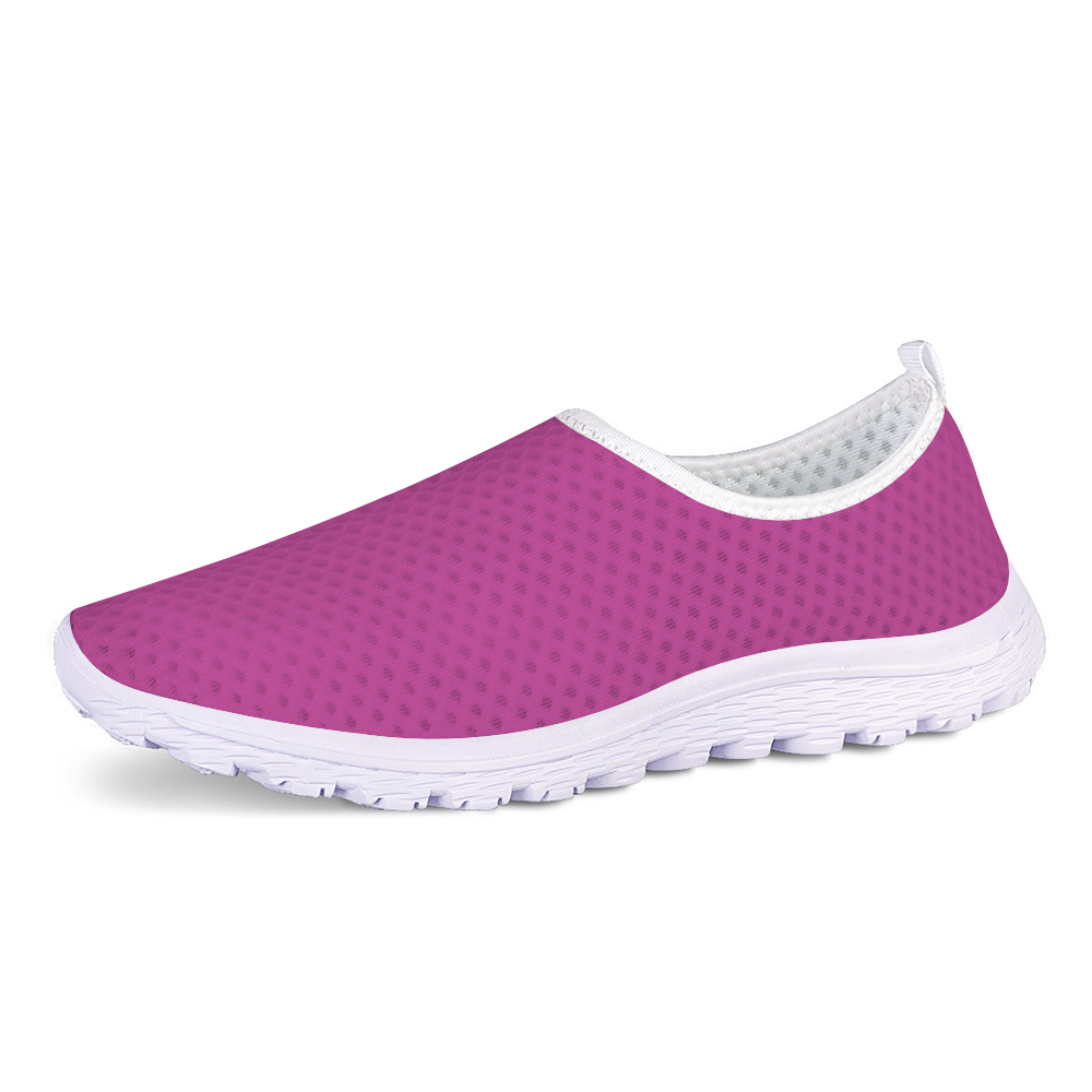 The Melanin Love Cushion Kicks are stylish slip-on sneakers in pink, featuring a slip-resistant white sole and a perforated mesh fabric design.