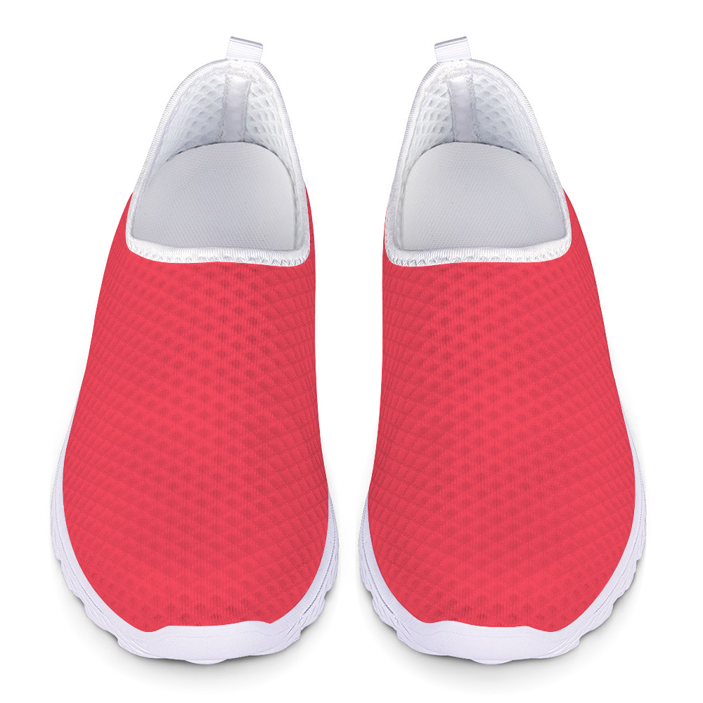 The Unstoppable Hustle Kushion Kicks feature a single red slip-on design with a white sole and mesh fabric, angled slightly to the side, ideal for fans of athletic sport shoes.