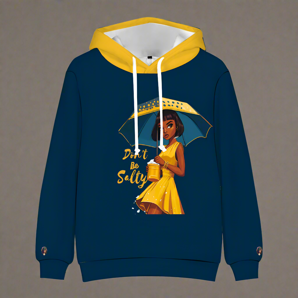 This navy and yellow pullover sweatshirt from the "Don't Be Salty" collection features a vibrant thermal transfer print of a person in a yellow dress with an umbrella, accompanied by the playful text "Don't Be Salty.