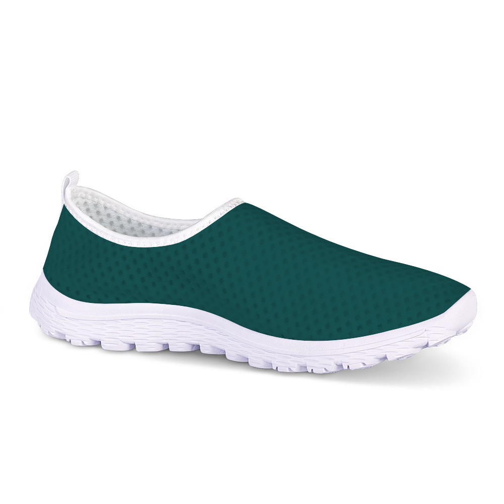 Meet the Philly Jawn Cushion Kicks: teal slip-on sneakers designed for style and functionality, with a breathable mesh upper, white trim, cushioned textured sole, and slip-resistant technology.